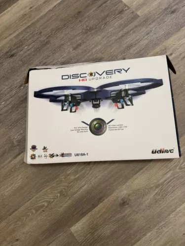 Discovery HD drone with 4K camera box, UDIrc branding and drone illustration