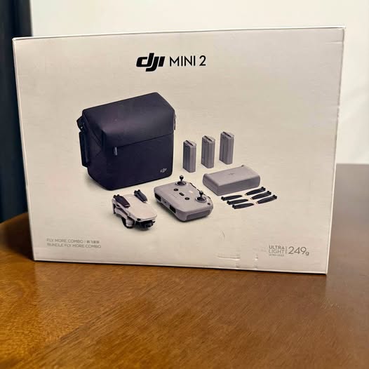 DJI Mini 2 drone kit box with drone, remote, propellers