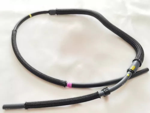 Braided black cord with inline connectors and a small yellow and pink band