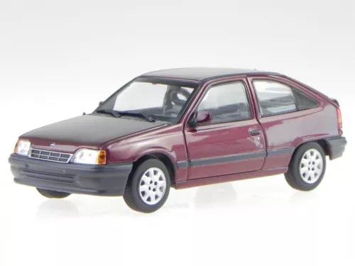 Red 3-door diecast model car with front-left view, chrome grille and silver wheels