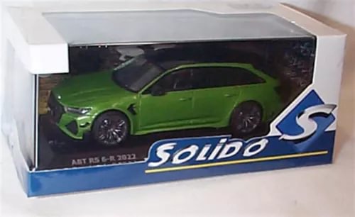 Green diecast sports car model in display box with Solido logo