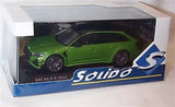 Green diecast sports car model in display box with Solido logo