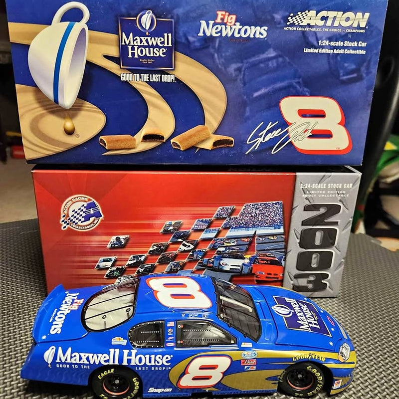 Blue #8 NASCAR diecast stock car with front and side view in display box
