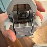 Compact drone camera module with F2.2 lens and gimbal mount