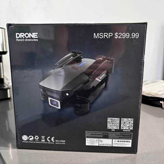 Drone retail box with pictured foldable drone and front LED light