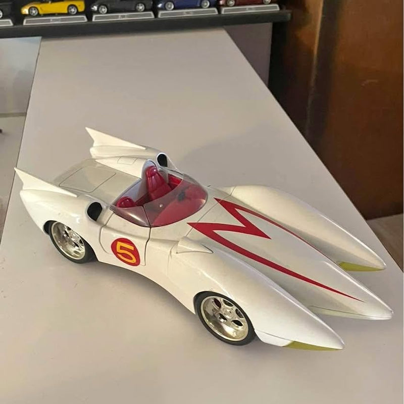 Diecast race car, white body with red lightning stripe and number 5