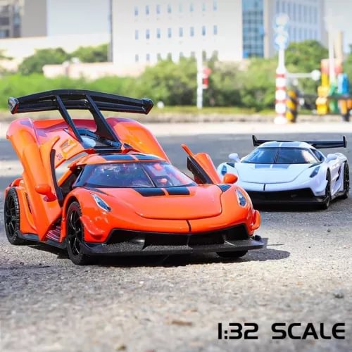 Orange alloy diecast sports car model with open doors, front three-quarter view.
