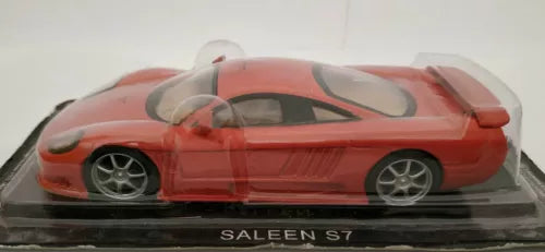 Red Saleen S7 diecast scale model car with black racing stripe, on display base