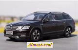 Skoda Octavia diecast model car, black station wagon, front three-quarter view