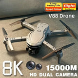Light gray folding quadcopter drone with dual cameras and four extended propellers
