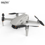 White mini quadcopter drone with 4 propellers and camera gimbal