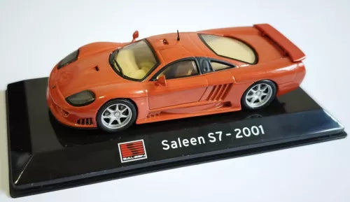 Orange diecast model car with display base, Saleen S7 2001 label