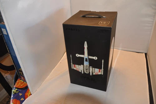Collector’s edition X-wing style battling drone in black retail box