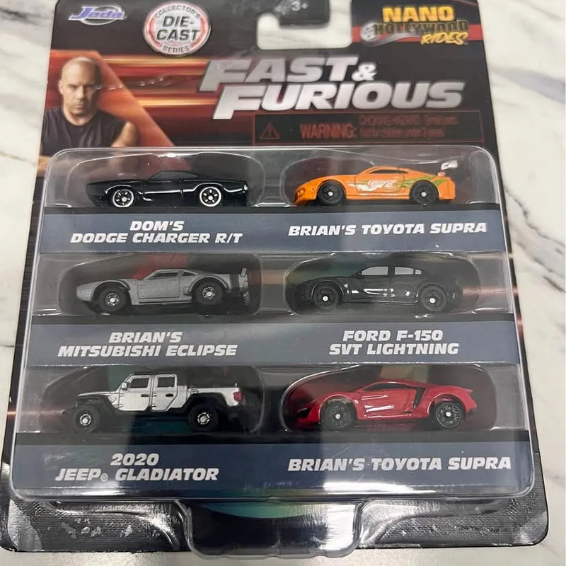 Mini diecast car blister pack with six racing vehicles, including orange and red cars
