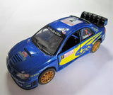 Blue 1:36 scale rally car diecast with gold wheels, front 3/4 view