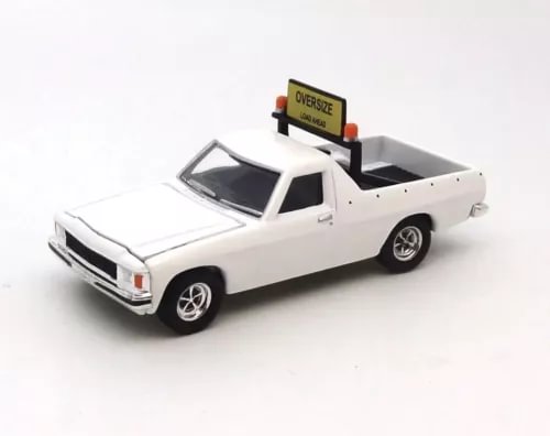 White 1982 Holden WB V8 pilot ute diecast model car with roof sign