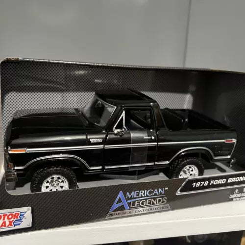 1978 Ford Bronco black diecast SUV model, chrome grille and wheels