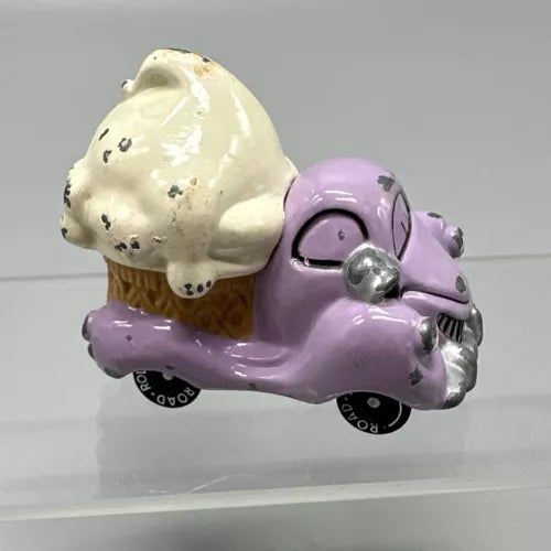 Purple diecast ice cream truck toy with white scoop and front wheels