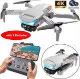 White RC drone with 4K FPV camera and handheld controller with phone screen