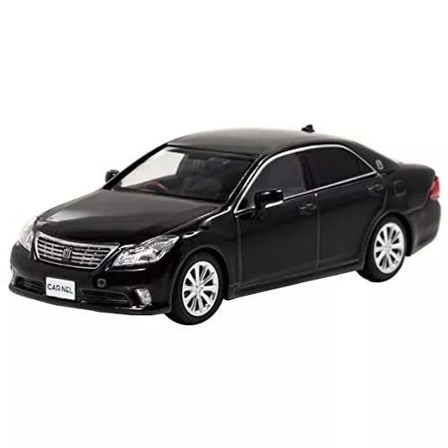 Black diecast sedan model car with silver wheels, front 3/4 view