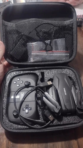 Camera drone carrying case with controller and charging cables