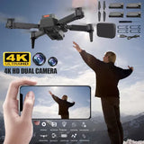 Foldable quadcopter drone with dual 4K cameras and spare propellers