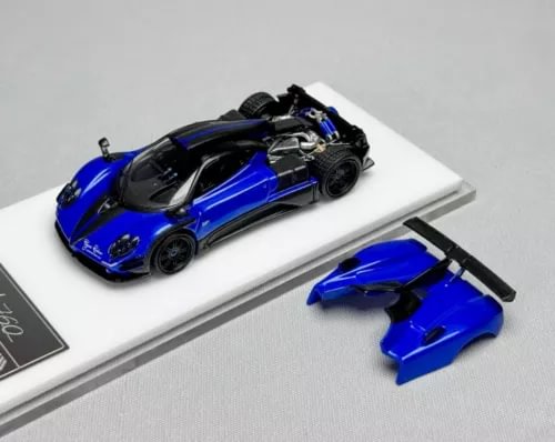 1/64 scale blue diecast sports car model with removable parts