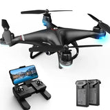 Black quadcopter drone with blue lights, controller, and two spare batteries