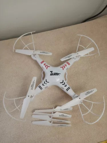 White 6-axis quadcopter drone with four propellers