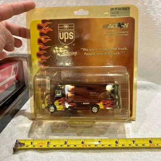 UPS diecast package car in retail blister box, flame racing livery, 1:64 scale
