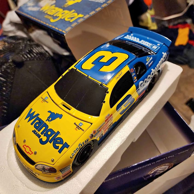 Yellow and blue diecast race car with #3 hood and windshield decals