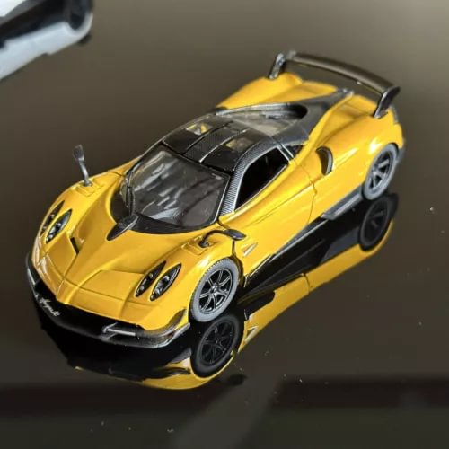 Pagani Huayra BC yellow 1:36 diecast model car with black wheels and vents