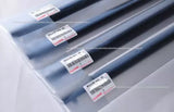 Silver diecast car body panel with four barcode stickers
