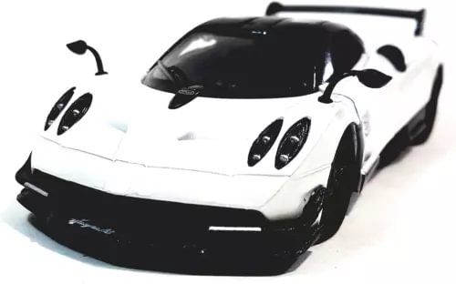 Diecast toy car model in white with black accents, Pagani Huayra BC 5400D