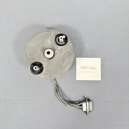 Motor drone motor assembly with circular metal housing and attached cable