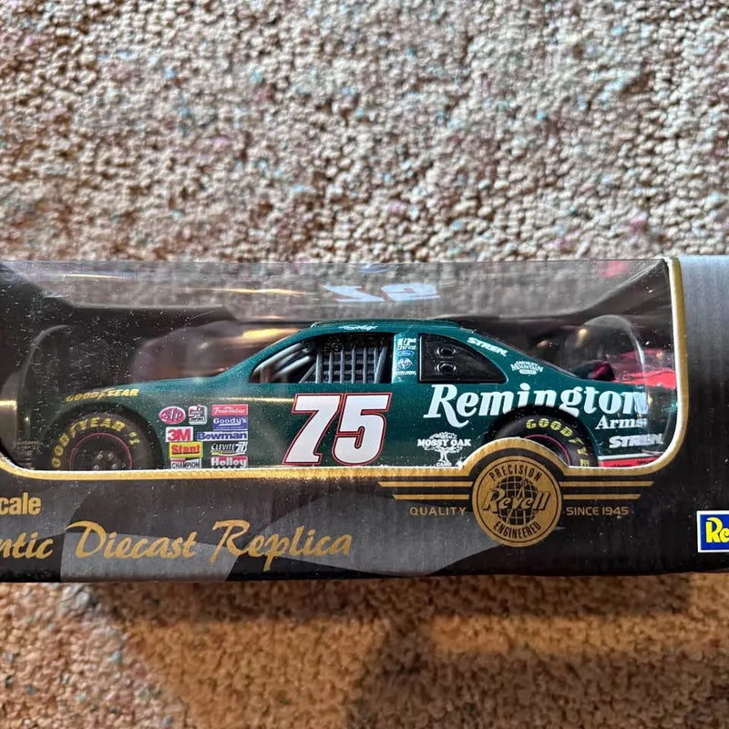 Diecast collector car replica with teal and black livery, #75 Morgan Shepherd