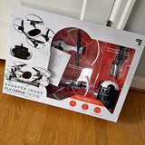 Sharper Image fly-drive drone starter kit box with red drone and controller