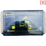 Diecast Peugeot 202 van model in clear display box with blue base