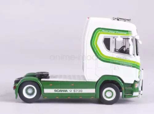 Green and white Scania S730 tractor unit diecast truck, side view with cab details
