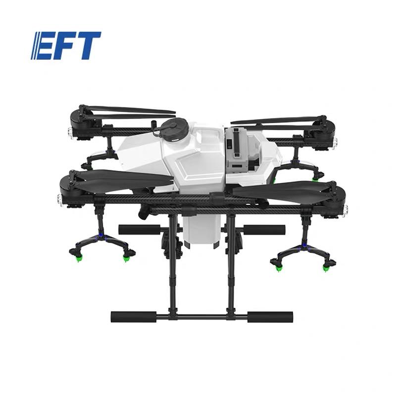 EFT agricultural spray drone with white body and black spray boom arms