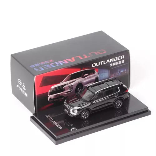 Black 1/64 scale Mitsubishi Outlander SUV diecast model toy with display box