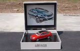 Red alloy diecast car model in open display box with foam insert