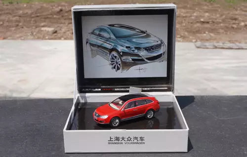 Red alloy diecast car model in display box with foam insert