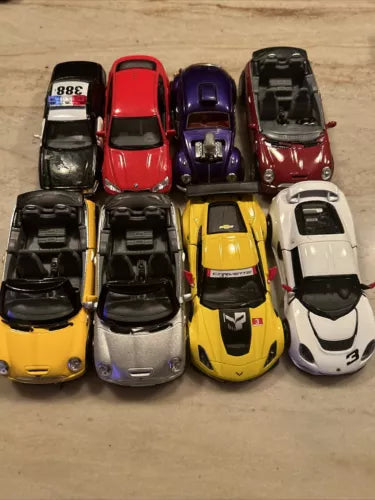 1:36 diecast car lot of 8 toy vehicles, assorted colors including red, purple, black, yellow, white