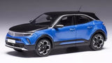 Ixo OPEL MOKKA 2022 diecast model car in blue, front three-quarter view