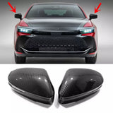 Diecast car front with LED headlights, dark grille, and carbon-style mirrors