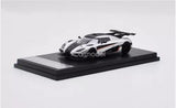 Silver diecast car model toy on black display base, front three-quarter view