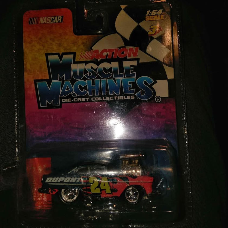 Red #24 diecast NASCAR race car in blister package with Dupont logo