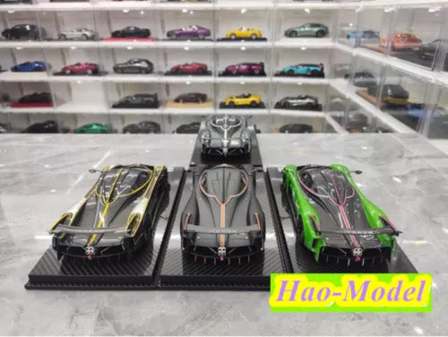 1/18 Pagani Huayra R diecast model car set with green, yellow, gray cars on stands