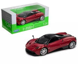 1:24 red Pagani Huayra diecast model car with black roof, shown in box